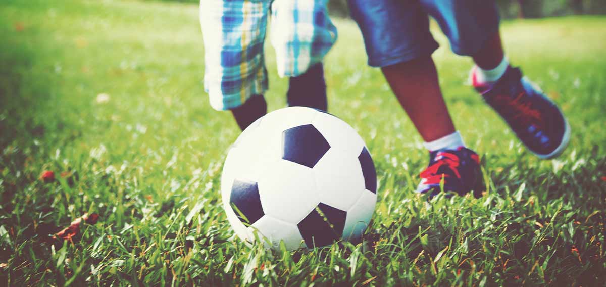 children playing soccer