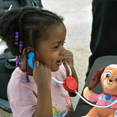 zoo guest listens to their bear's heartbeat